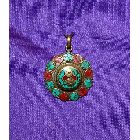 Bronze pendant from Nepal .